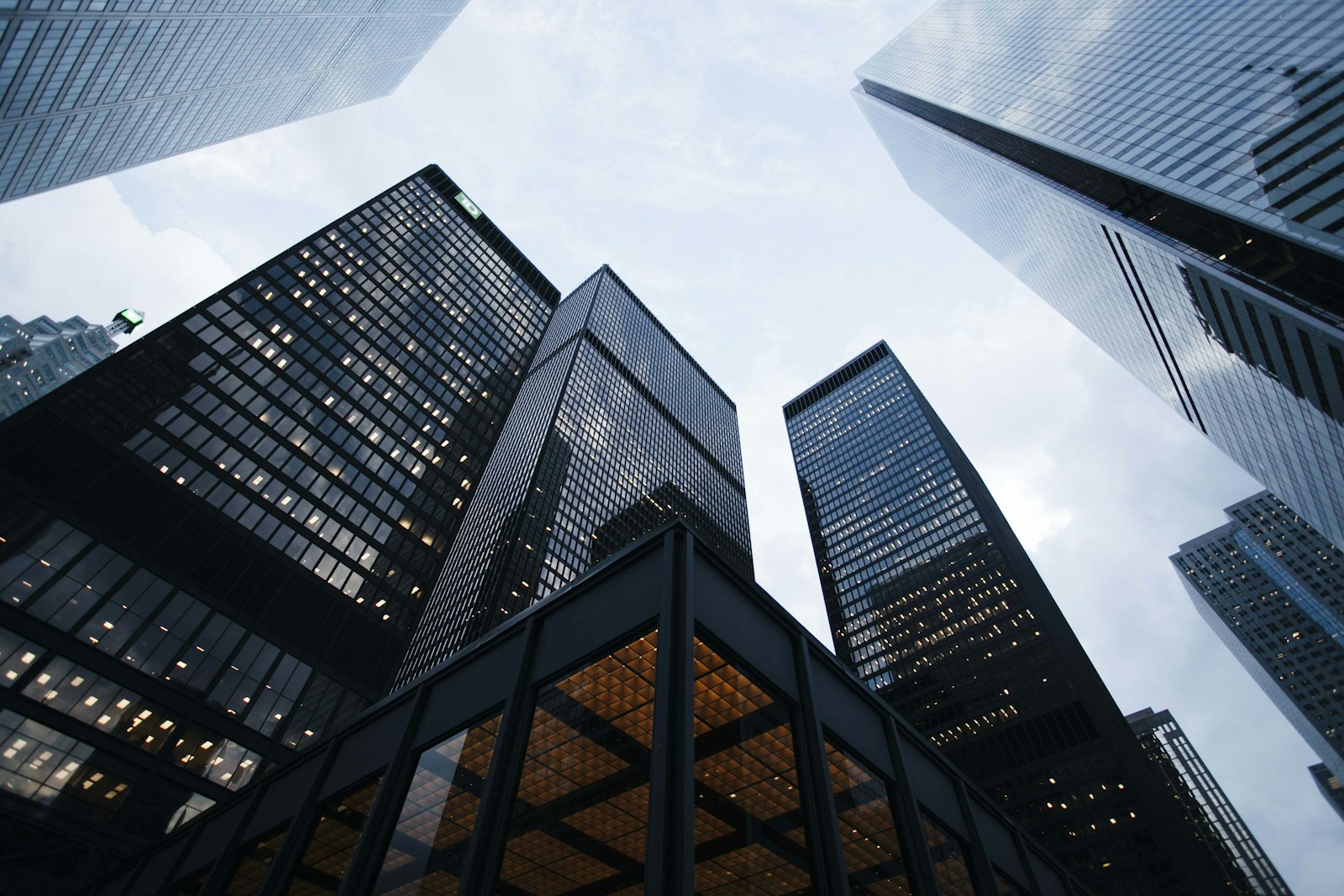 Photograph of modern commercial office towers viewed from street level
